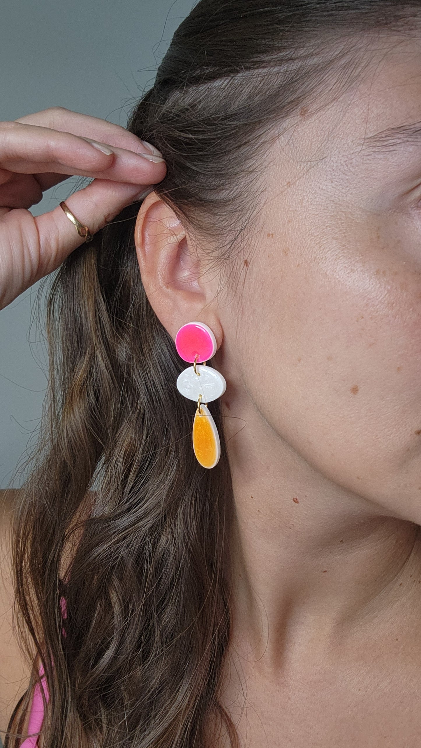 Aros Marea fucsia, blanco y naranjo